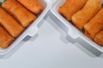 Risoles or risoles, is a traditional Indonesian snack. It contains mayonnaise mixed with eggs, sausage, vegetables and sometimes minced chicken, sprinkled with breadcrumbs and fried.