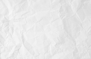 White recycled paper sheet as background with crumpled and rough pattern.