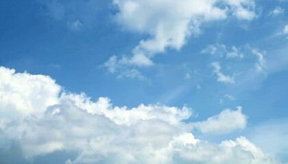 Naklejka premium Cumulus clouds in the blue sky