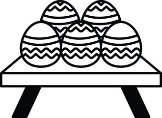 A table with four eggs on it