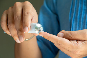 Woman's hand. Apply topical steroids. Pain relief from muscle inflammation, medical concept