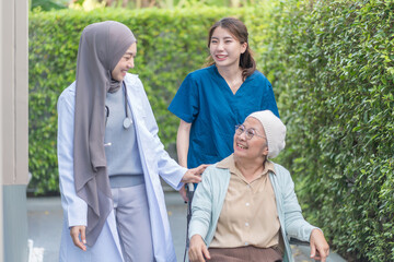 health care workers take care senior cancer patient in wheelchair,talking,empowering,empathy,mental...