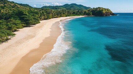 Obraz premium Aerial view of a tropical beach with golden sand and crystal-clear blue waves gently washing ashore