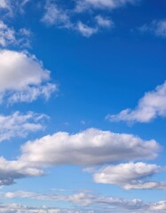 Fototapeta premium Stunning Blue Sky with Fluffy Cumulus Clouds