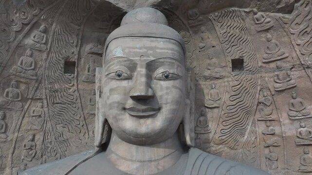 The Yungang Grottoes in Datong, Shanxi Province, China, were originally built 1500 years ago during the Northern Wei Dynasty, featuring,Ancient Buddha sculptures，Buddha's Head
