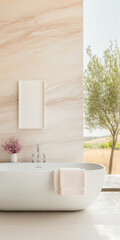 Fototapeta premium Elegant modern bathroom with a freestanding tub and beautiful outdoor view