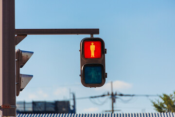 Red people traffic light for signal Pedestrian waiting or stop passing no cross the road in Japan