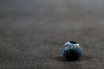 Close-up of blueberries on dark background.Fresh Blueberry Bounty. Close-up of ripe juicy blueberries filling the frame