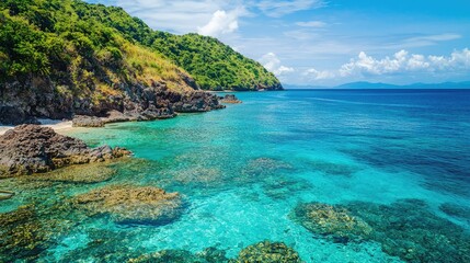 Fototapeta premium Stunning Tropical Beach with Clear Water and Rocky Coastline