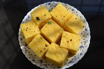 Dokhla is a savory spongy dish native to Gujarat state of India.