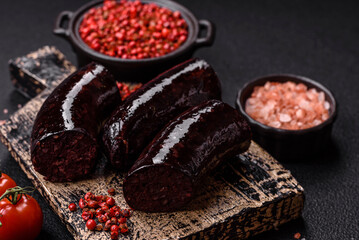 Delicious black blood sausage or black pudding with spices and herbs