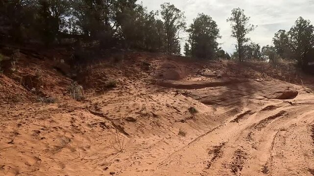 Utah riding desert red sand UTV recreation POV. Southwest recreation exploring. Desert mountain Canyon recreation area. Remote wilderness off road 4x4 and explore the environment.
