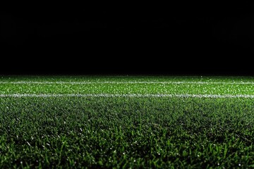 Night Football Field: Green Grass and White Lines Under Dark Sky