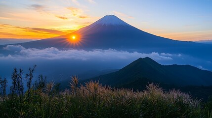 Fototapeta premium Majestic Mountain Peak at Breathtaking Sunrise Evoking Revitalization and Retreat