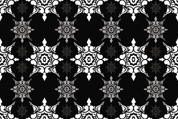 Floral pattern. Vintage wallpaper in the Baroque style. Seamless vector background. White and black ornament for fabric, wallpaper, packaging. Ornate Damask flower.