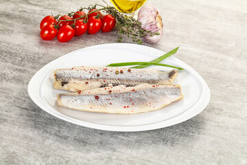Marinated herring fillet with green onion