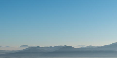 Distant hilltops in the mist, Slovenia.