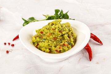 Guacamole with avocado, tomato and chili