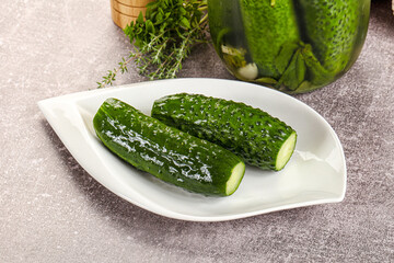 Homemade lighty salted cucumbers with herbs