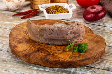 Steamed pork tongue with mustard