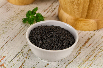 Black dry Nigella seeds in the bowl