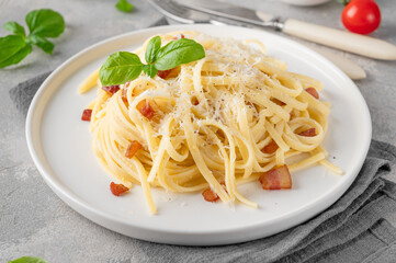 Traditional Italian pasta Carbonara. Spaghetti with bacon, egg and parmesan cheese. Top view, copy space.