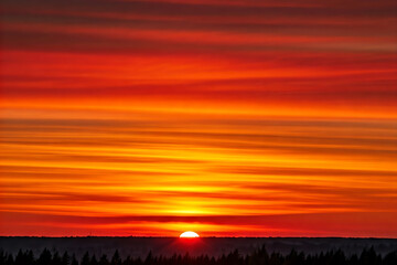 Sunset over sea beach area field with colorful aesthetic sky clouds