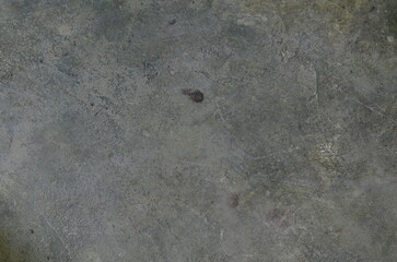 showcases a rough, textured concrete surface. It's ideal for backgrounds, textures, or illustrating construction, urban decay, or industrial themes. detail and contrast, design projects, web graphics