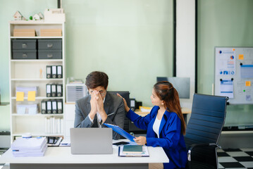 Workplace stress and conflict with this intense scene of professionals in a heated office discussion