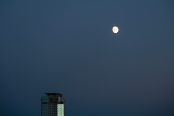 moon and building in the night