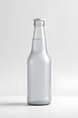Clear Glass Bottle of Carbonated Beverage Against a Light Background
