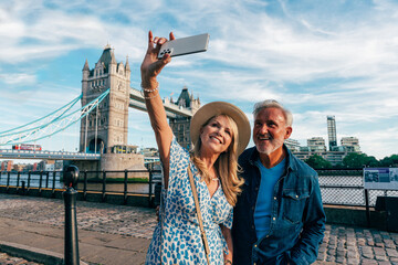 Happy senior couple spending time together in London city. Concepts about seniority, lifestyle and...