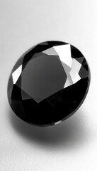 Black gemstone with brilliant facets, meticulously photographed against a neutral background, highlighting its luxurious texture and intricate cut.