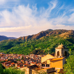 Obraz premium Mountain town view. Mountain landscape of beautiful village in Sicily, Italy. A town in a beautiful mountain valley. Mountain valley town during sunset in evening light