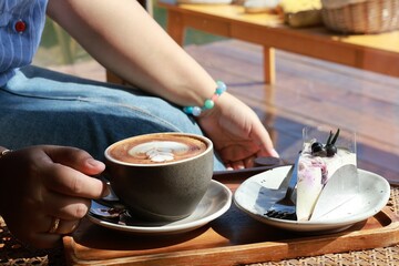 person holding a cup of coffee