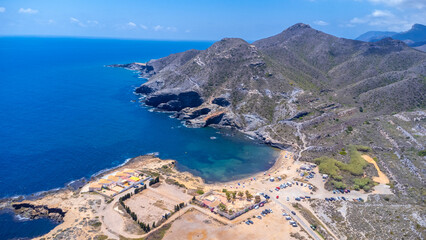 Obraz premium Drone capturing cala reona beach and mediterranean sea in cabo de palos, spain