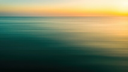 Obraz premium a close up of a blurry photo of the ocean at sunset