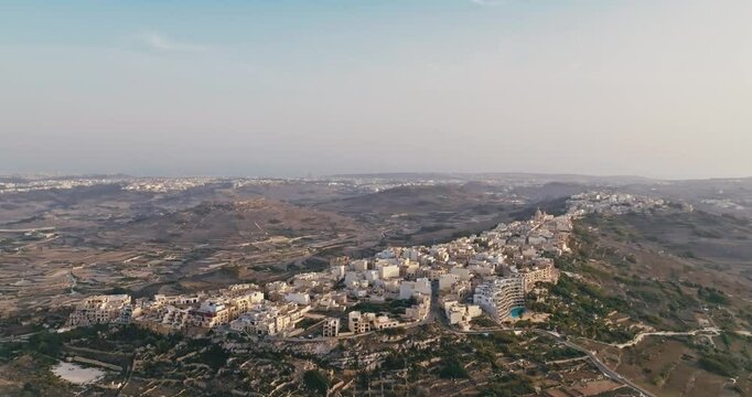 Aerial view cityscape of Zebbug island of Gozo Malta. Historical architecture of Mediterranean tourist towns. High quality 4k footage