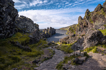 At the entrance to Djúpalónssandur Black Beach on the Snæfellsnes Peninsula in Iceland, visitors encounter the historic Aflraunasteinar stones