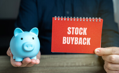 Stock buyback concept. Corporate action in which a company buys back its own shares from the open...