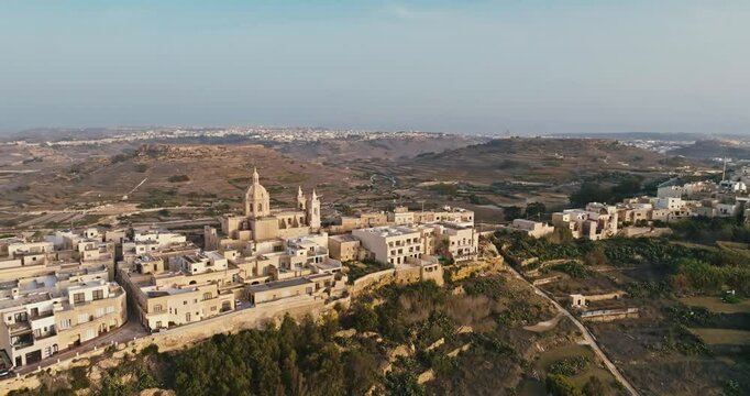 Stunning Aerial Footage of Parish Church and Ancient Streets in Zebbug Gozo Capturing Malta Historic Mediterranean Charm. High quality 4k footage