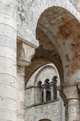 Fototapeta premium Romanesque stone arches and columns. Jumieges Abbey (Abbaye Saint-Pierre de Jumieges). Close-up . Seine-Maritime Departement, Normandy, France