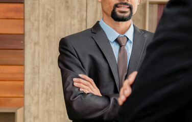 Businessman partnership is suit fist bump business deal negotiation successful,  Asian business man...