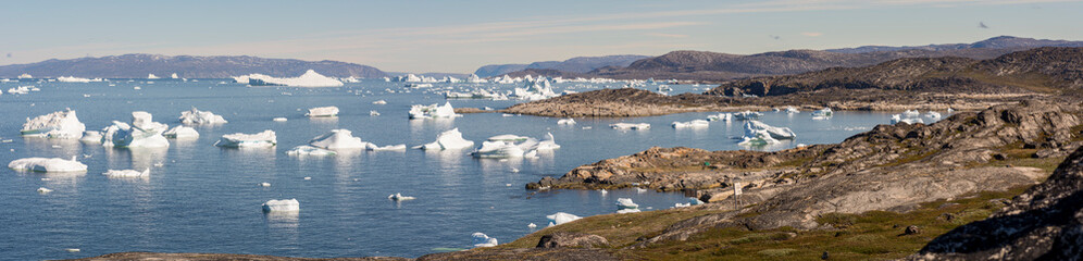 Coastal Landscape with Ocean and Icebergs near Ilulissat