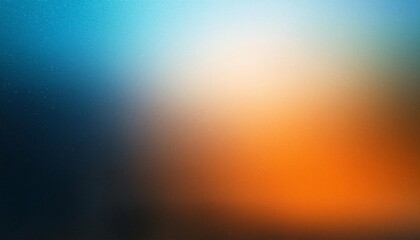 A soft, abstract image featuring blended hues of blue and orange, creating a dreamy, atmospheric effect.