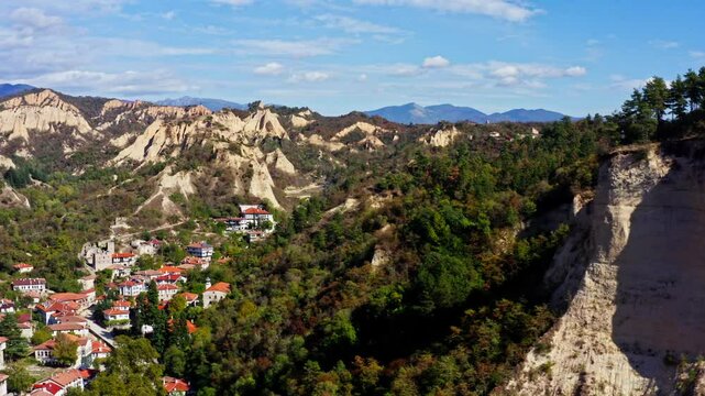 Drone slide reveals Bulgarian town Melnik in Pirin mountain landscape