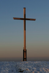 Summmit cross of Rechelberg mountain in wintertime, Bavaria, Germany