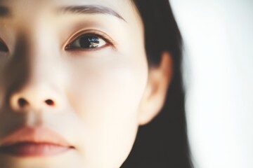 Close-up Portrait of a Young Woman's Face, Soft Light, Subtle Expression
