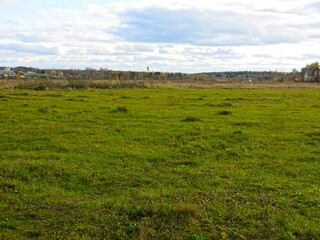 Obraz premium autumn landscape with fields and trees in the distance