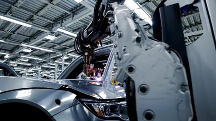 Assembly of advanced robotics in auto manufacturing facility showcases modern production techniques and precision engineering